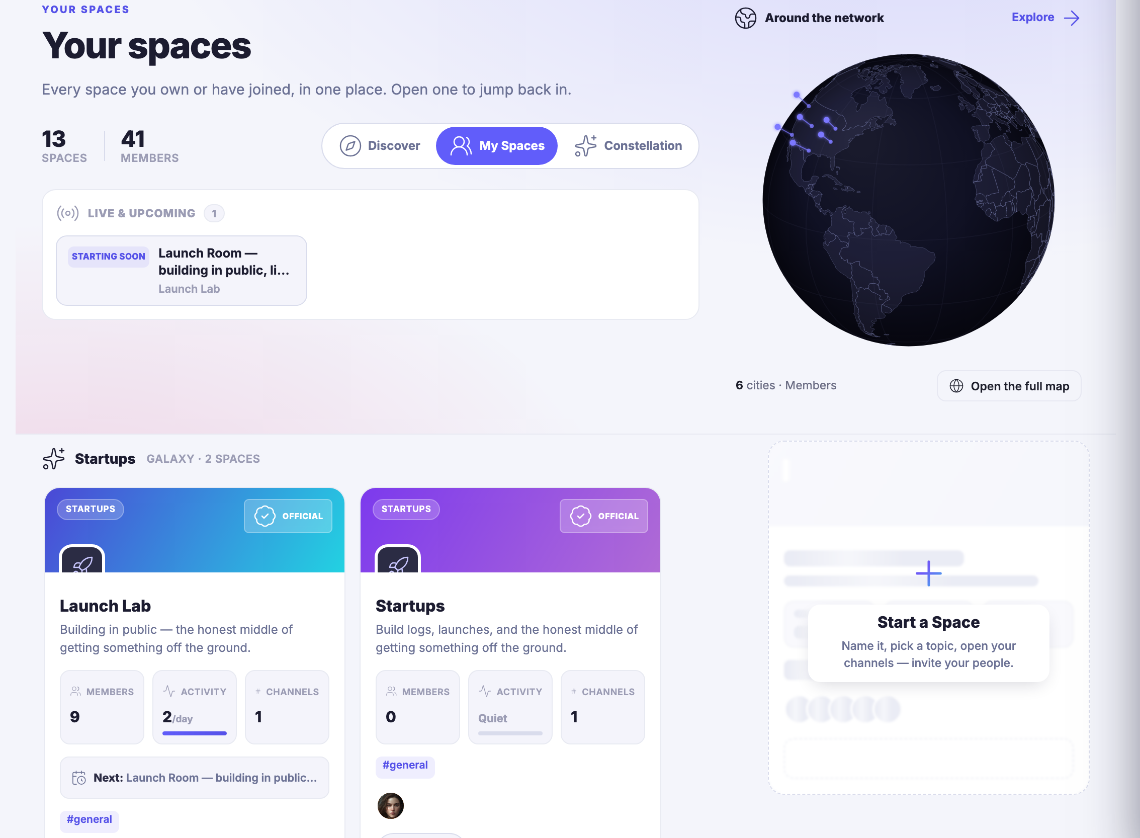 The Spaces area open on Your spaces: a header counting the spaces and members around the network, the tab row that switches between discovering rooms, your own, and the constellation, and a live-and-upcoming strip carrying a room that is about to start. Beside it, a dark globe headed Around the network with the cities members are in. Below, the member&rsquo;s own rooms as cards in their galaxy &mdash; each carrying its member count, its activity, its channels and a general channel chip &mdash; ending in the panel that starts a new space: name it, pick a topic, open your channels, invite your people.